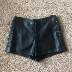 Black faux leather shorts